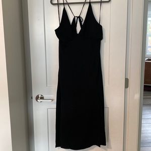 Strappy black dress with front slits